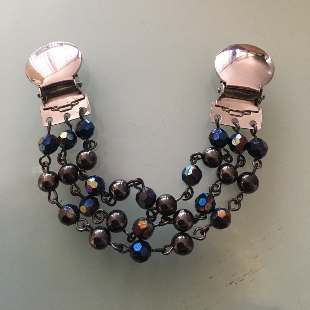 Sweater holder with beads